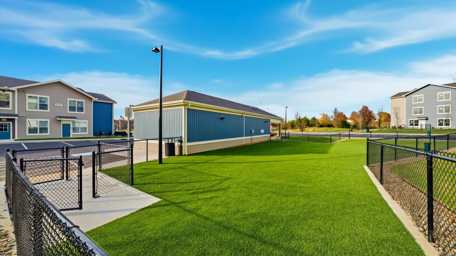 Off leash pet park near pet spa and car wash at Authentix Town Creek Apartments.