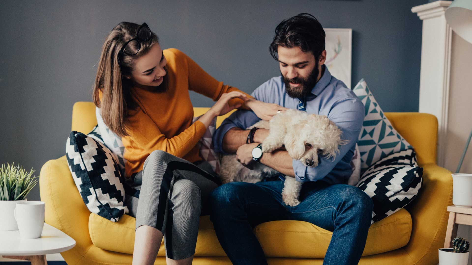 couple_on_couch_with_dog